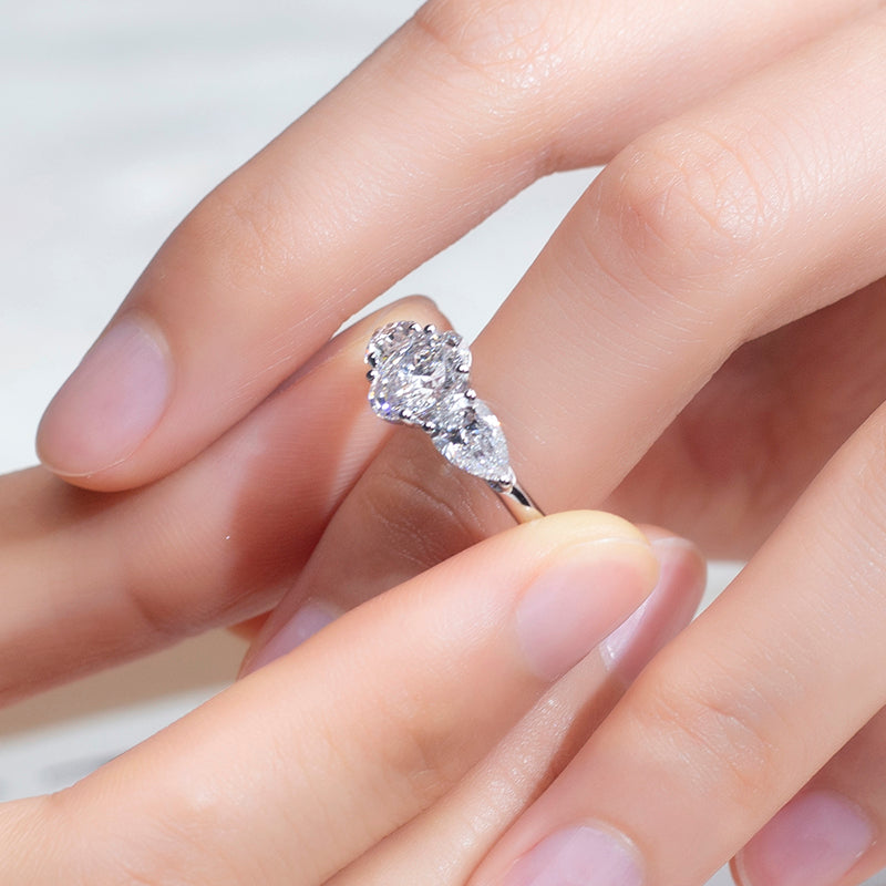 Timeless Harmony: 1 CT Oval and Pear Lab Grown Diamond Engagement Ring